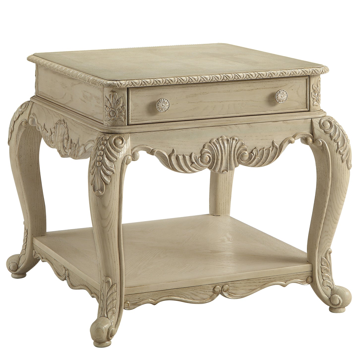 Elegant antique white end table with ornate carved details and single drawer