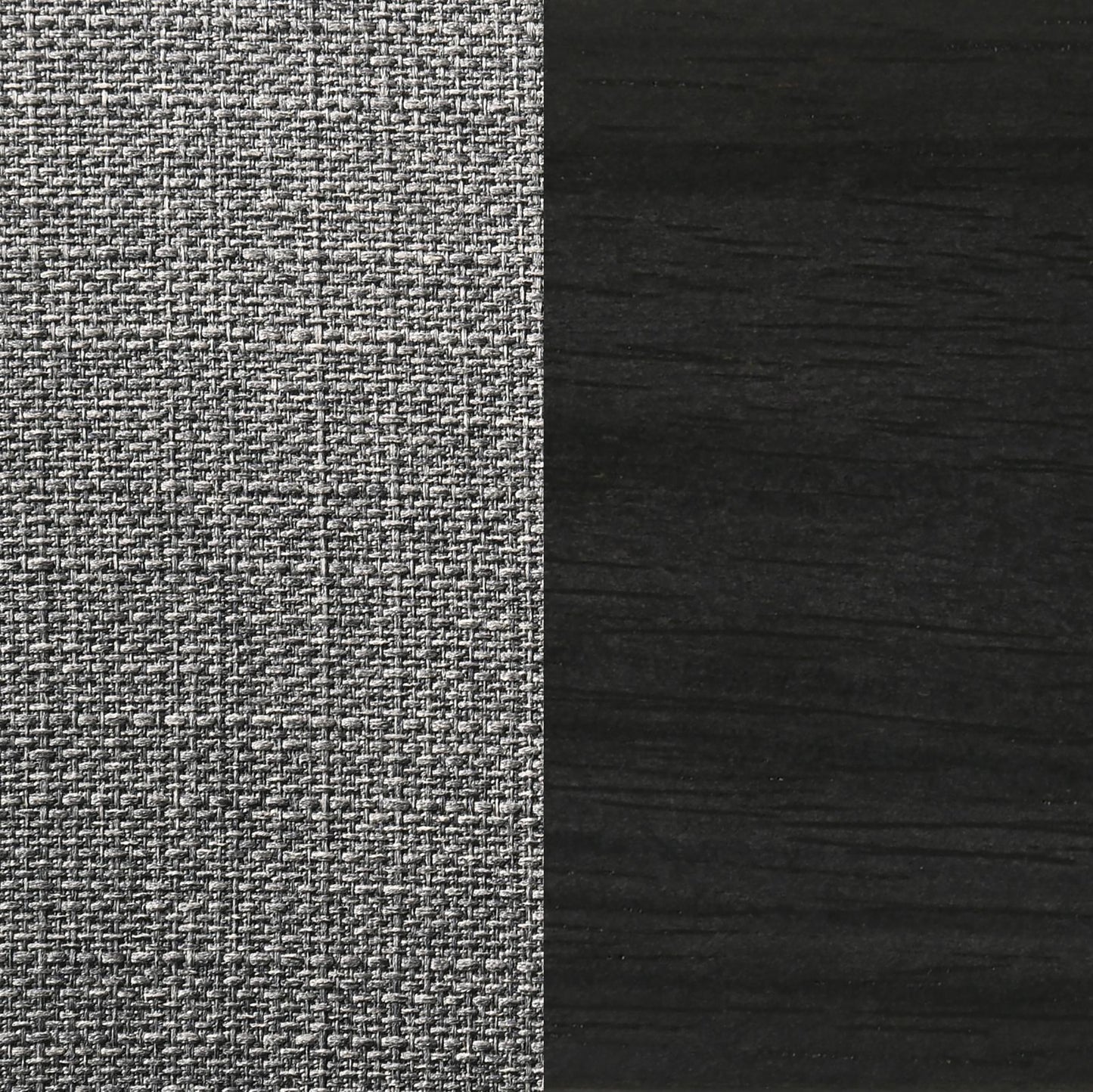 Closeup of a grey woven fabric texture with a dark wood grain background