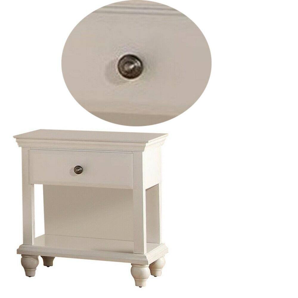 Cream nightstand with one drawer and open shelf featuring turned legs