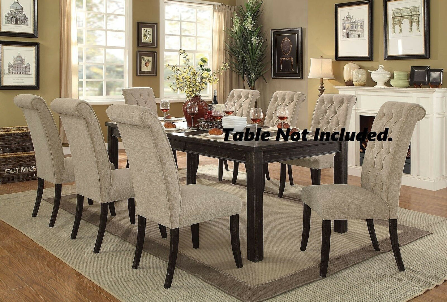 Tufted upholstered dining chair with a high rolled back in neutral beige linen