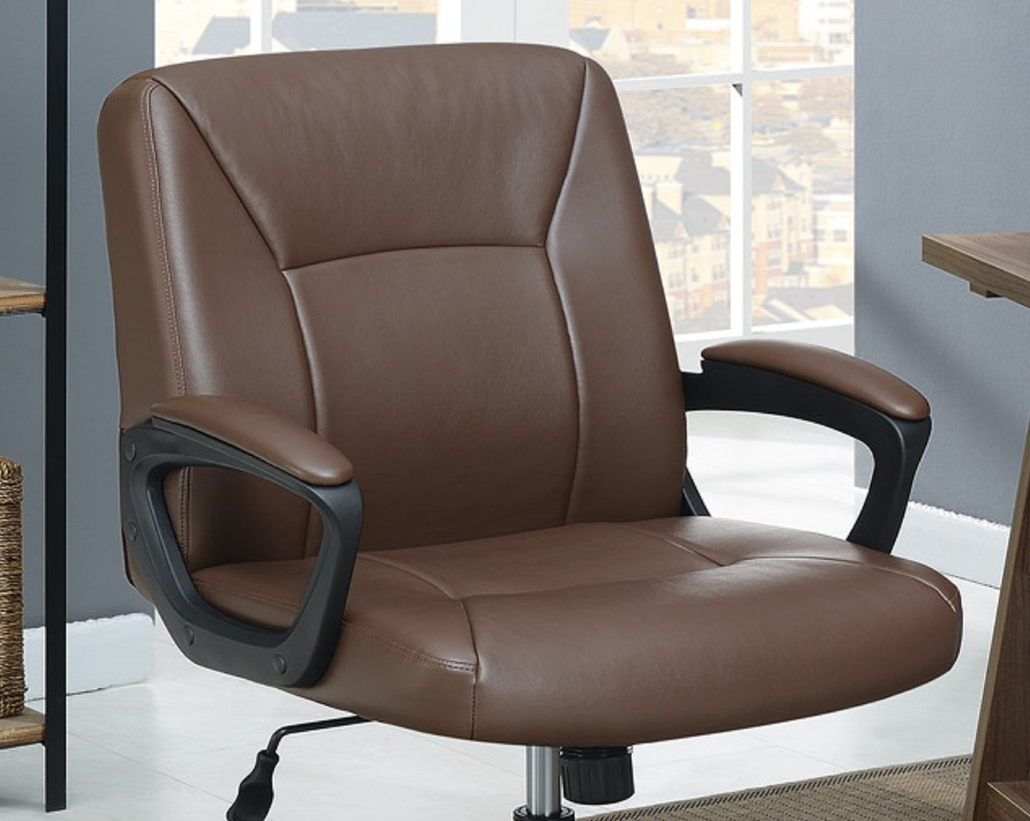 Brown leather executive office chair with padded armrests for comfort