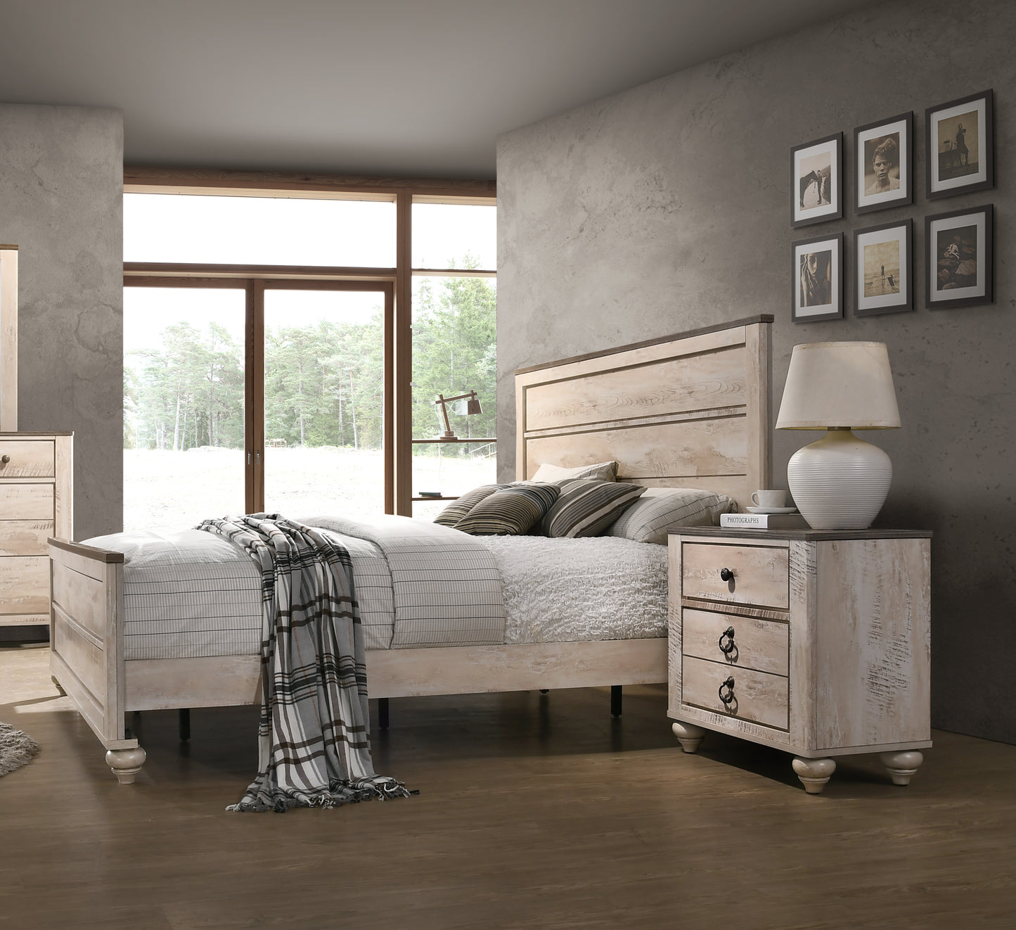 Whitewashed wood plank king bed frame with a plaid throw blanket draped over it