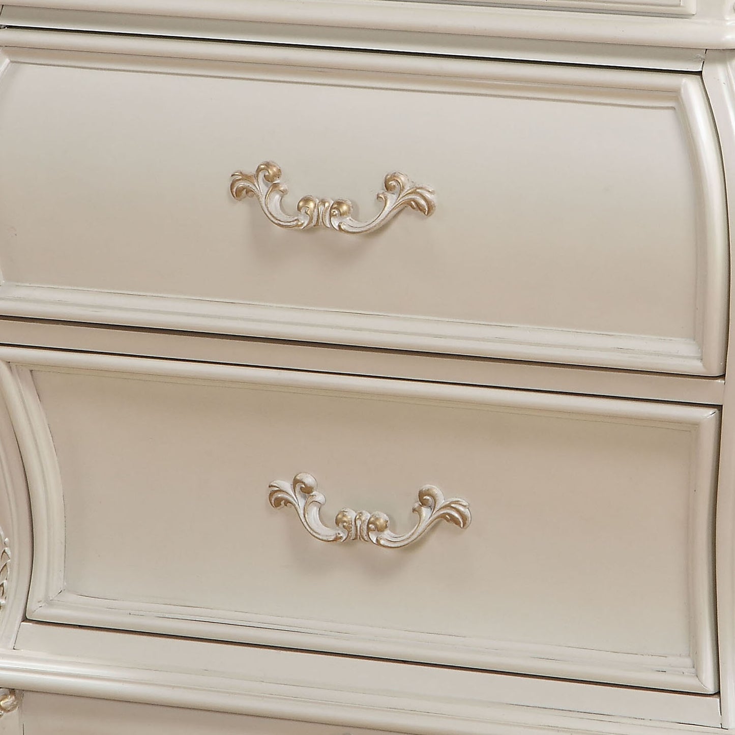 Cream dresser with ornate gold and white drawer pulls antique style