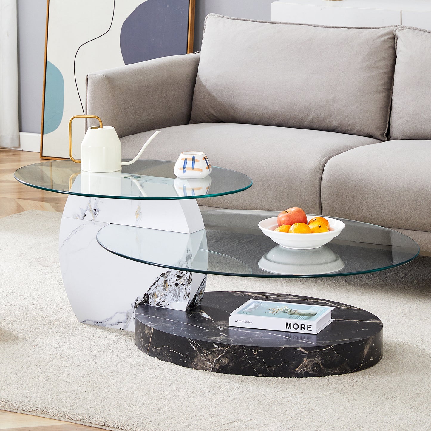 Oval glass coffee table with dual marble base and modern design