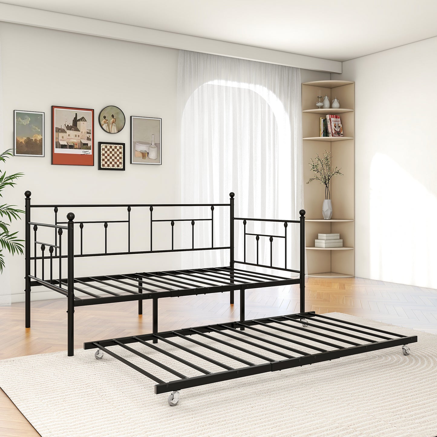 Black metal twin daybed with pullout trundle on casters