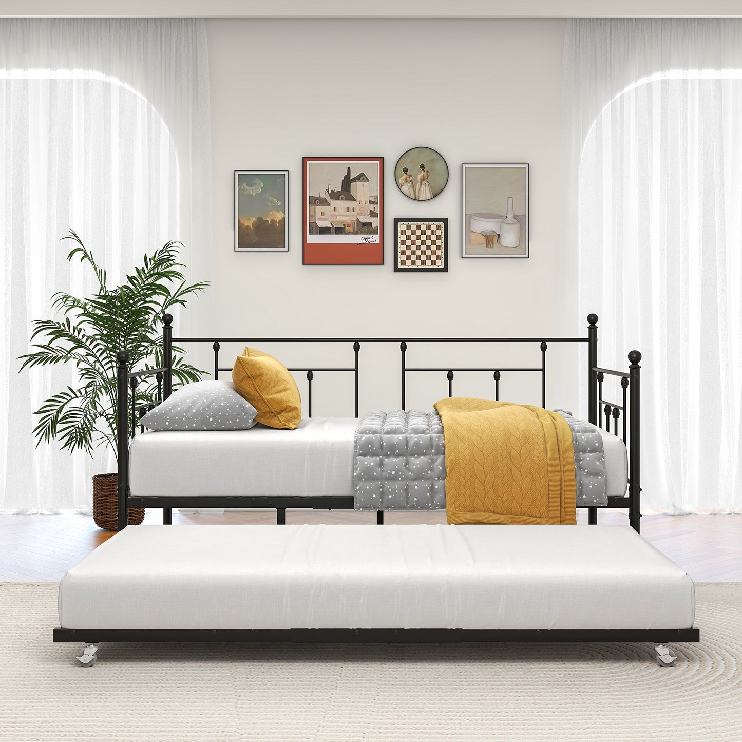 Black metal twin daybed with trundle grey star quilt yellow pillows and knit throw