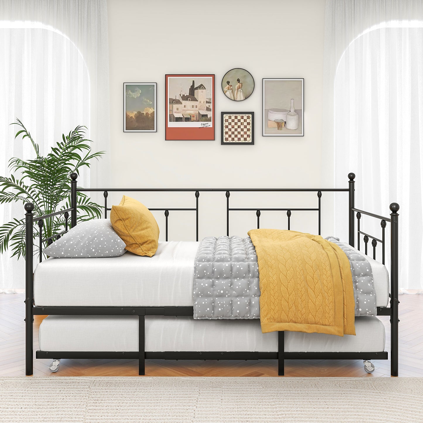 Black metal twin daybed with trundle perfect for guest rooms or small spaces