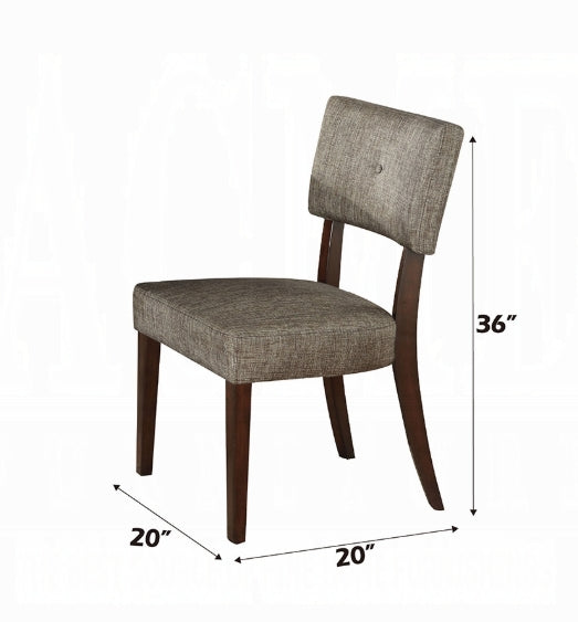 Textured grey fabric dining chair with dark wood legs and a single button tuft detail