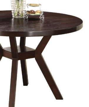 Dark wood round dining table with unique pedestal base perfect for small kitchens