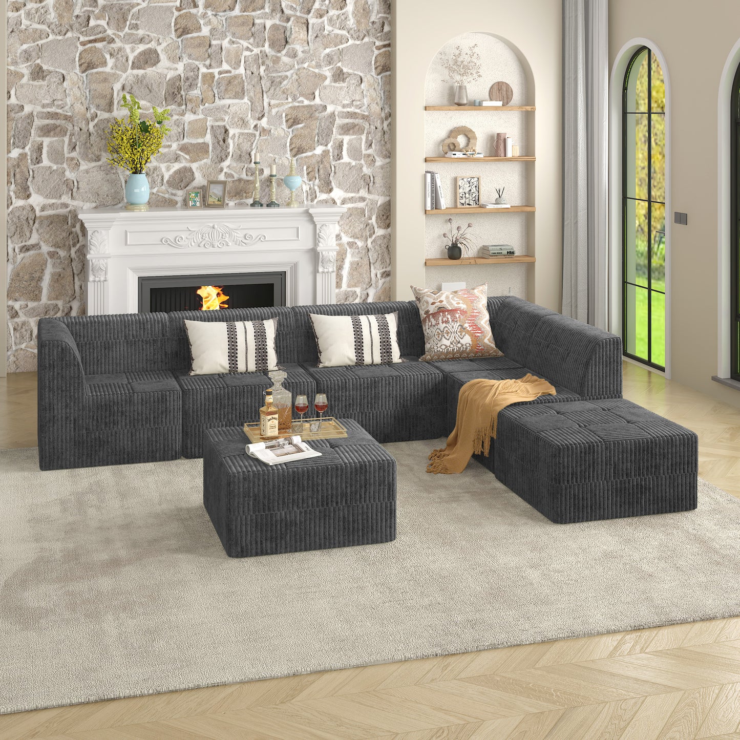 Dark gray corduroy sectional sofa with plush cushions and a modern design