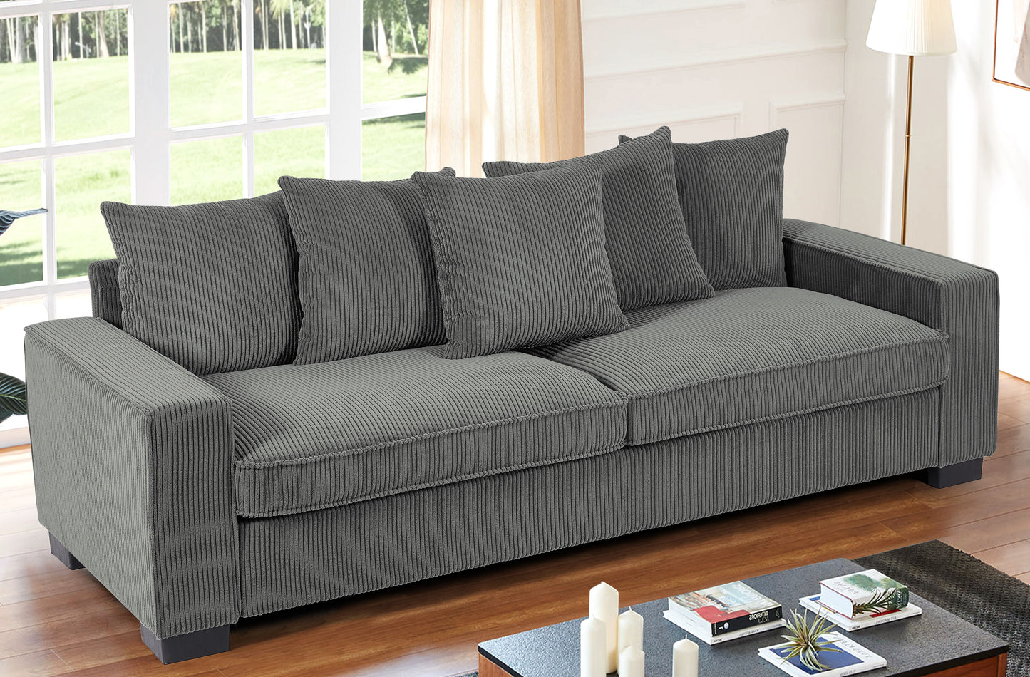 Comfortable charcoal corduroy threeseater sofa with plush cushions and clean lines for modern living rooms