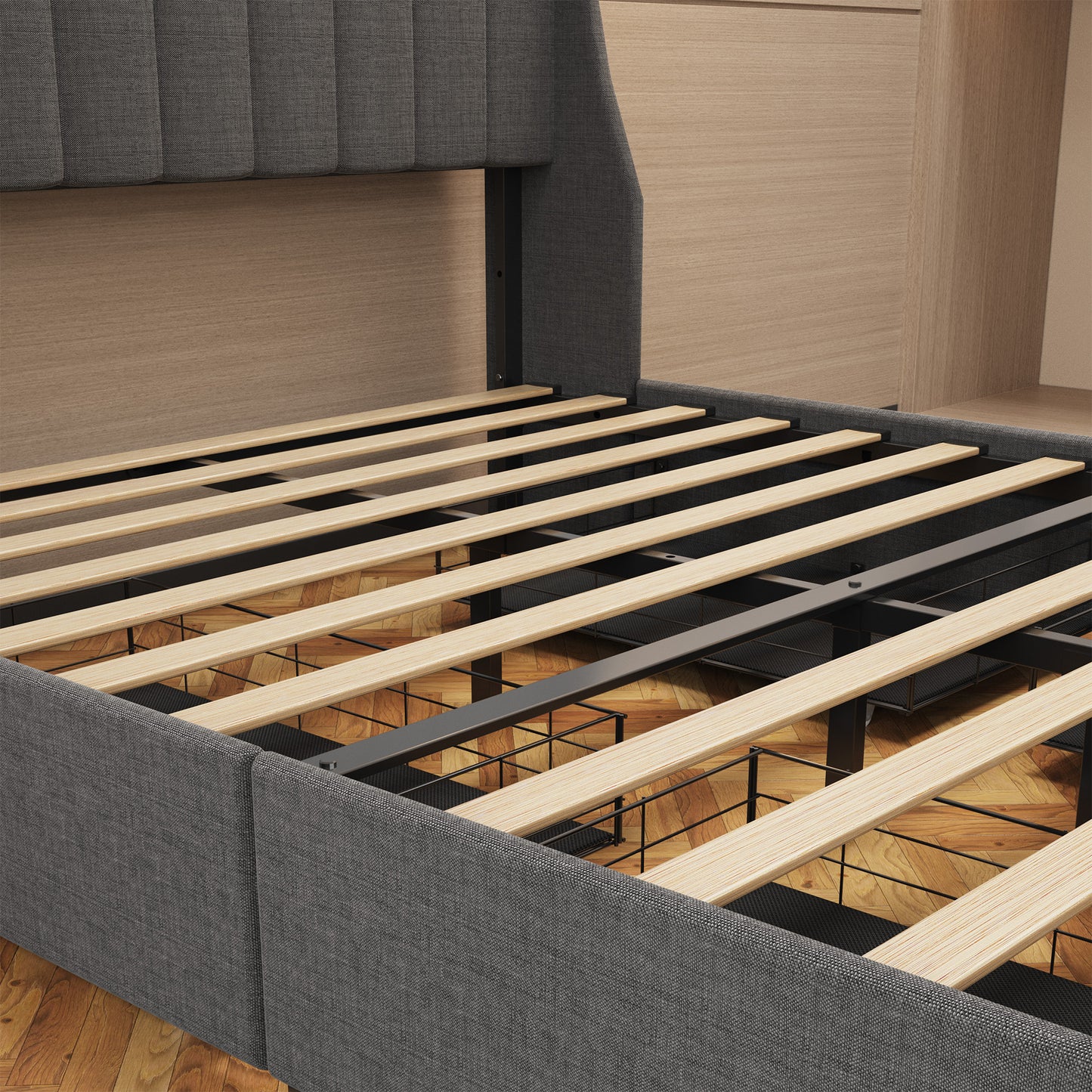 Gray upholstered bed frame showing internal wooden slats and metal support structure