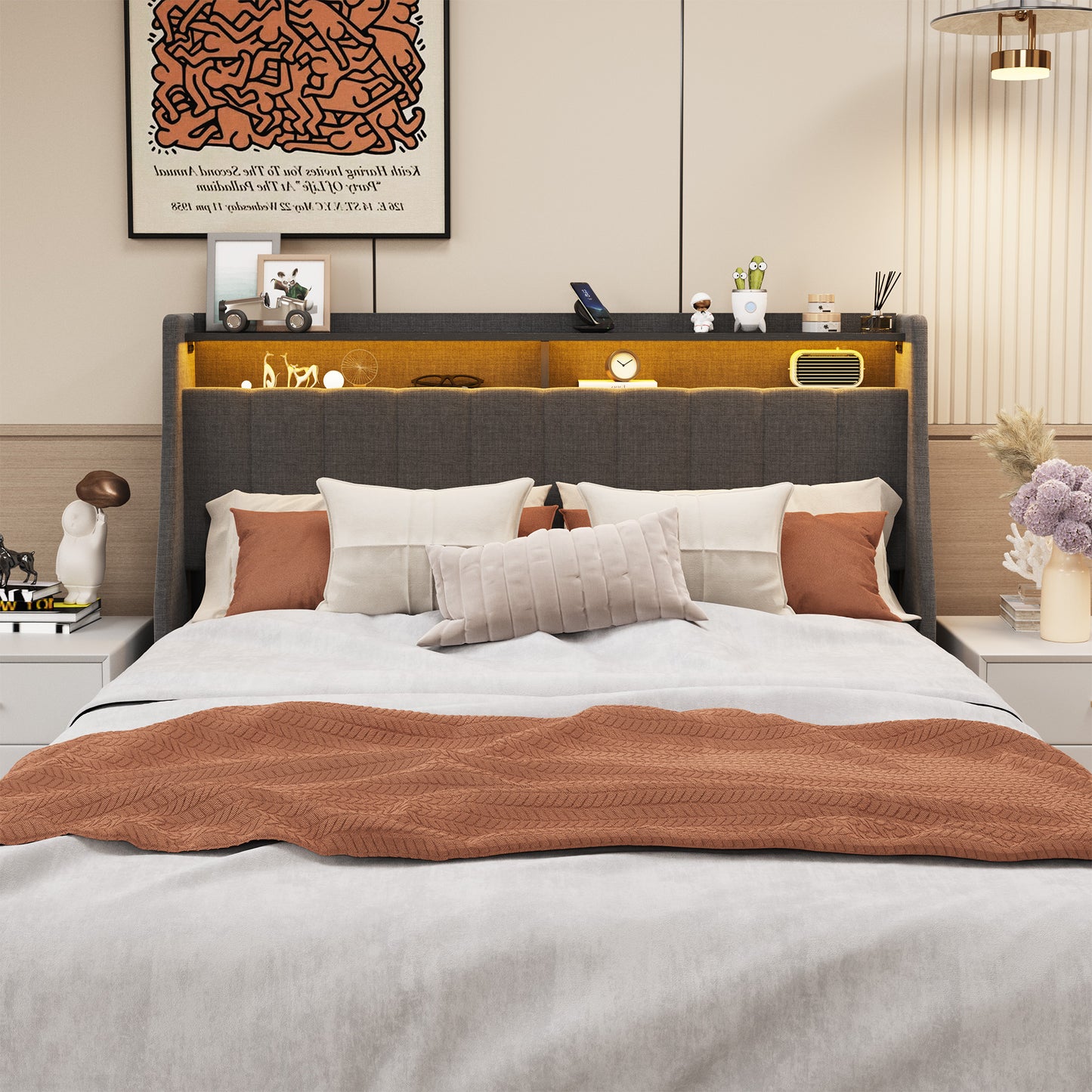 King size upholstered bed with charcoal headboard and warm LED lighting