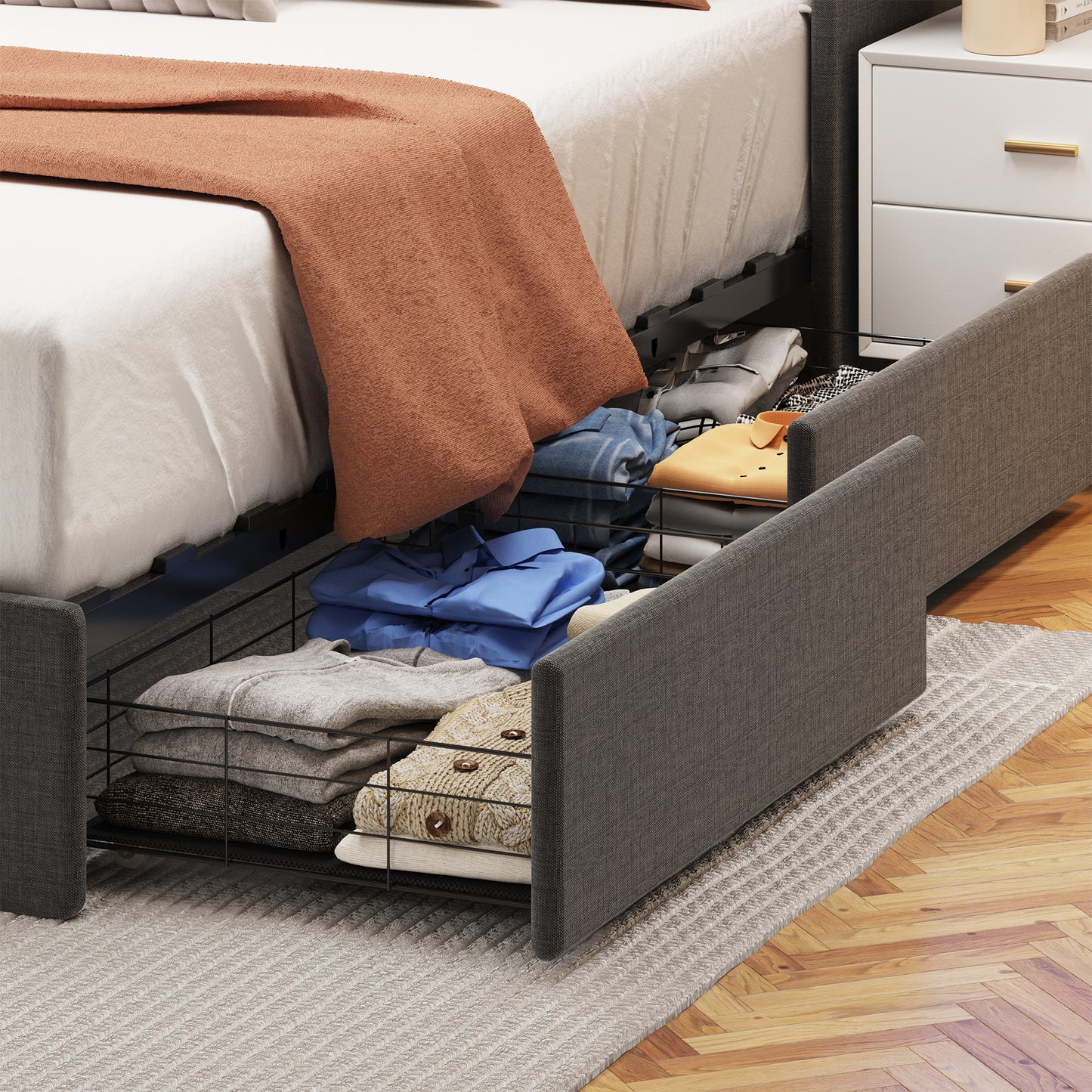 Gray upholstered bed frame with open storage drawers showing folded clothes