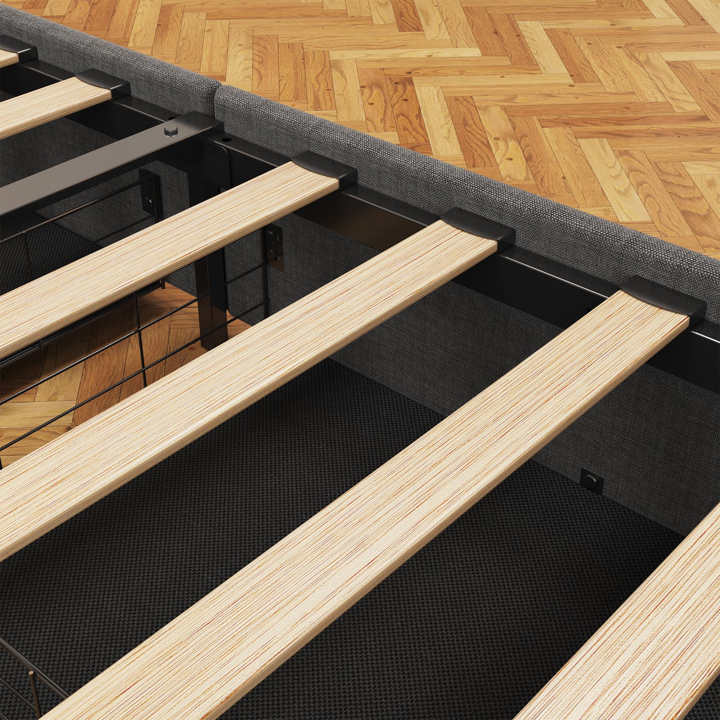 Closeup of gray upholstered bed frame with wooden slats