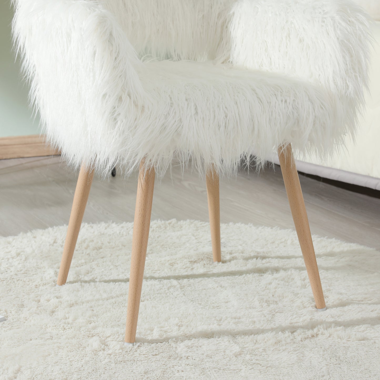 White faux fur accent chair with wooden legs cozy seating option