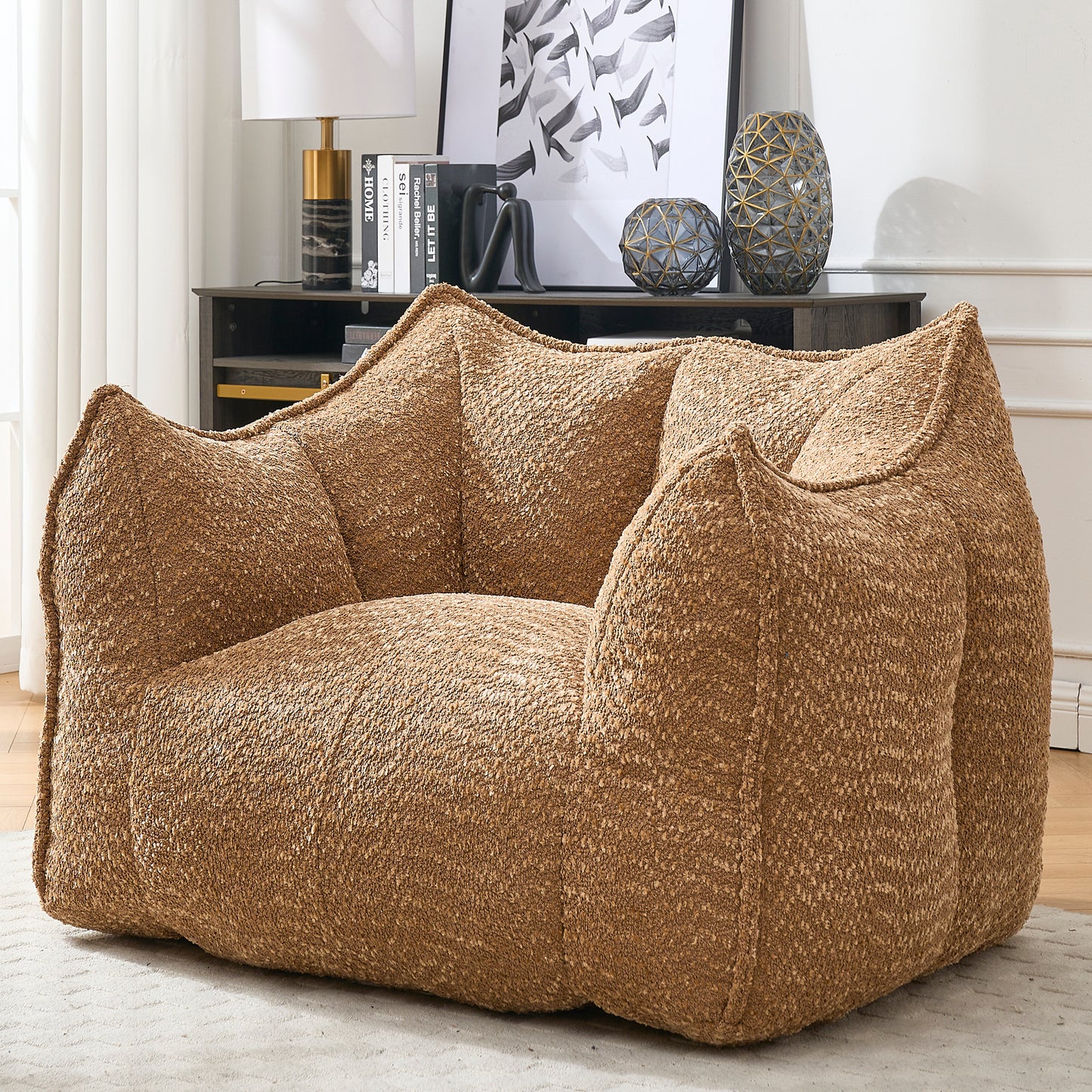 Cozy brown boucle armchair with plush oversized seating for ultimate comfort