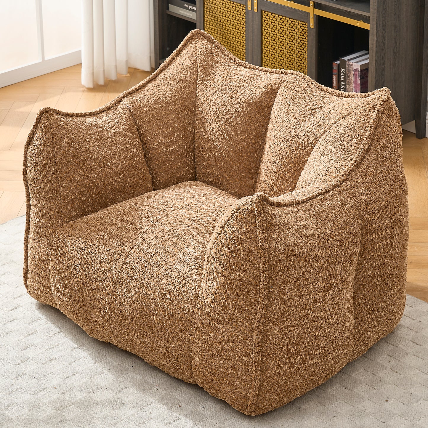 Comfortable boucl accent chair in a warm tan color perfect for cozy living rooms