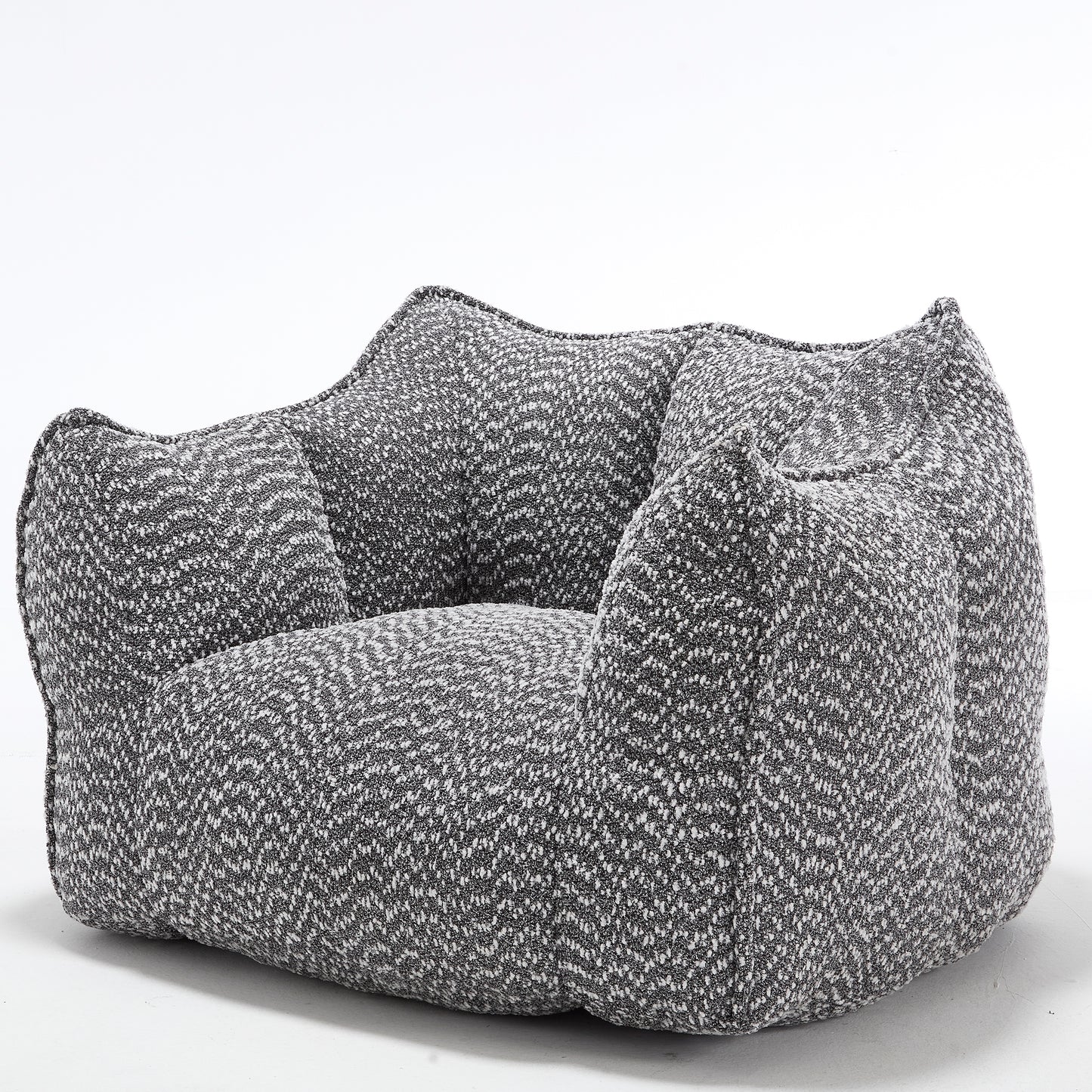 Plush grey and white boucle armchair a cozy accent chair for modern living rooms