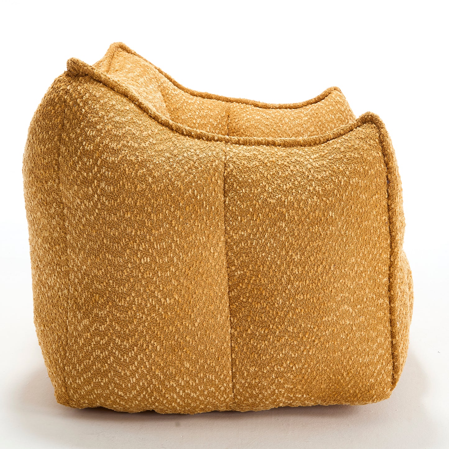 Textured ochre bean bag chair with stitched seams for a comfortable lounge area