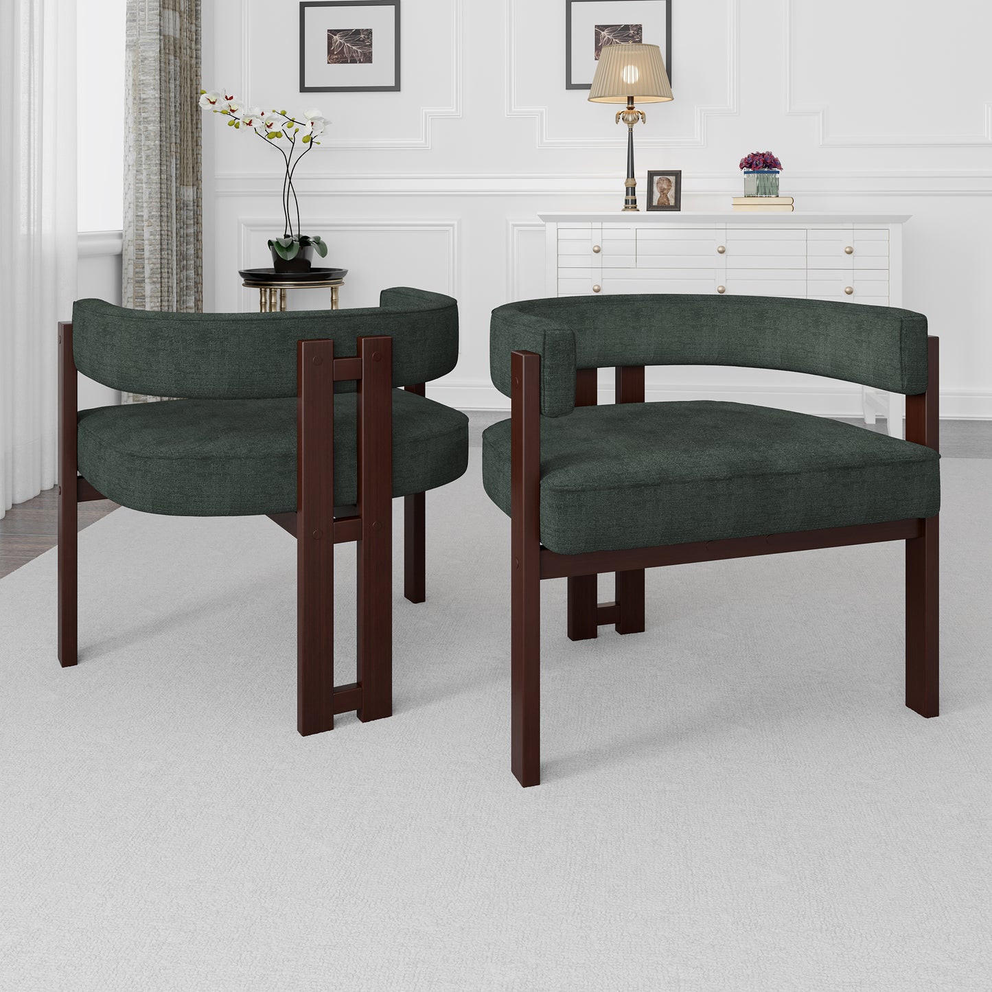Two dark green upholstered modern accent chairs with dark wood frames perfect for contemporary living rooms