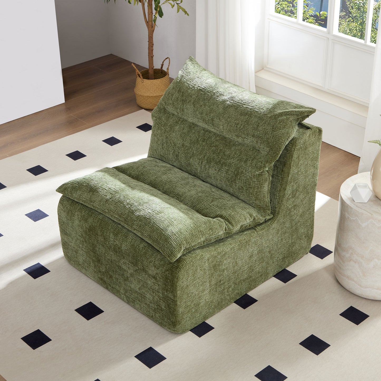 Plush green corduroy accent chair with deep comfortable seating for modern living rooms