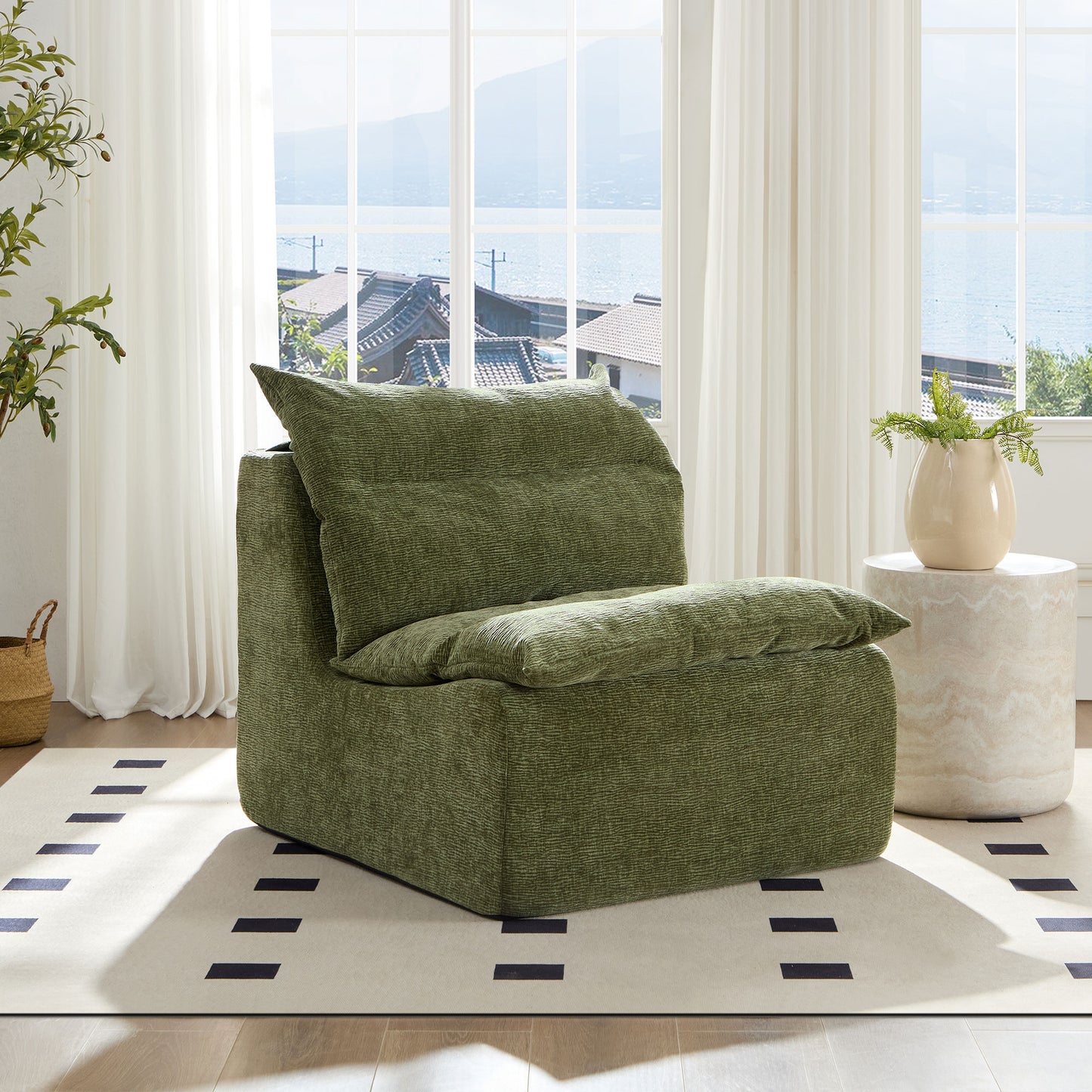 Textured olive green armchair with plush cushions and a cozy feel
