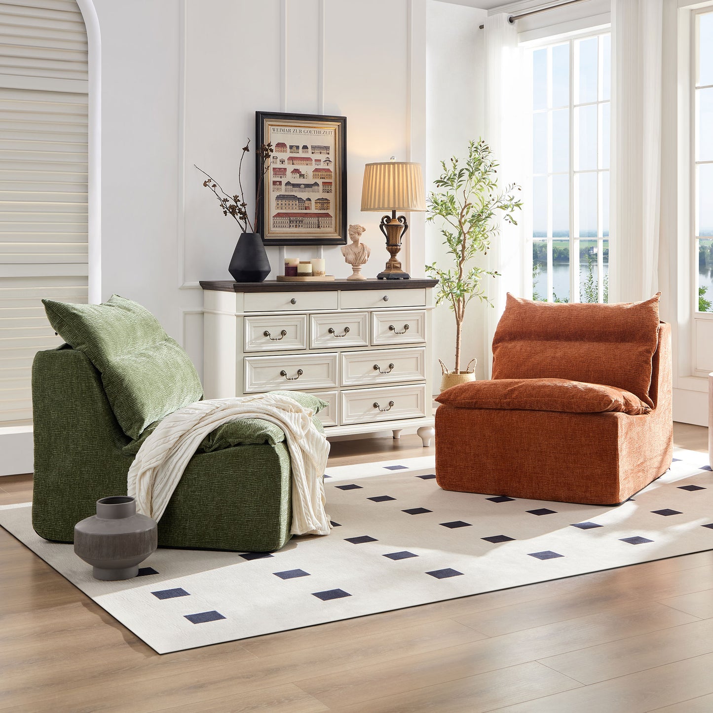 Green textured armchair with plush cushions and a cream knit throw draped over it