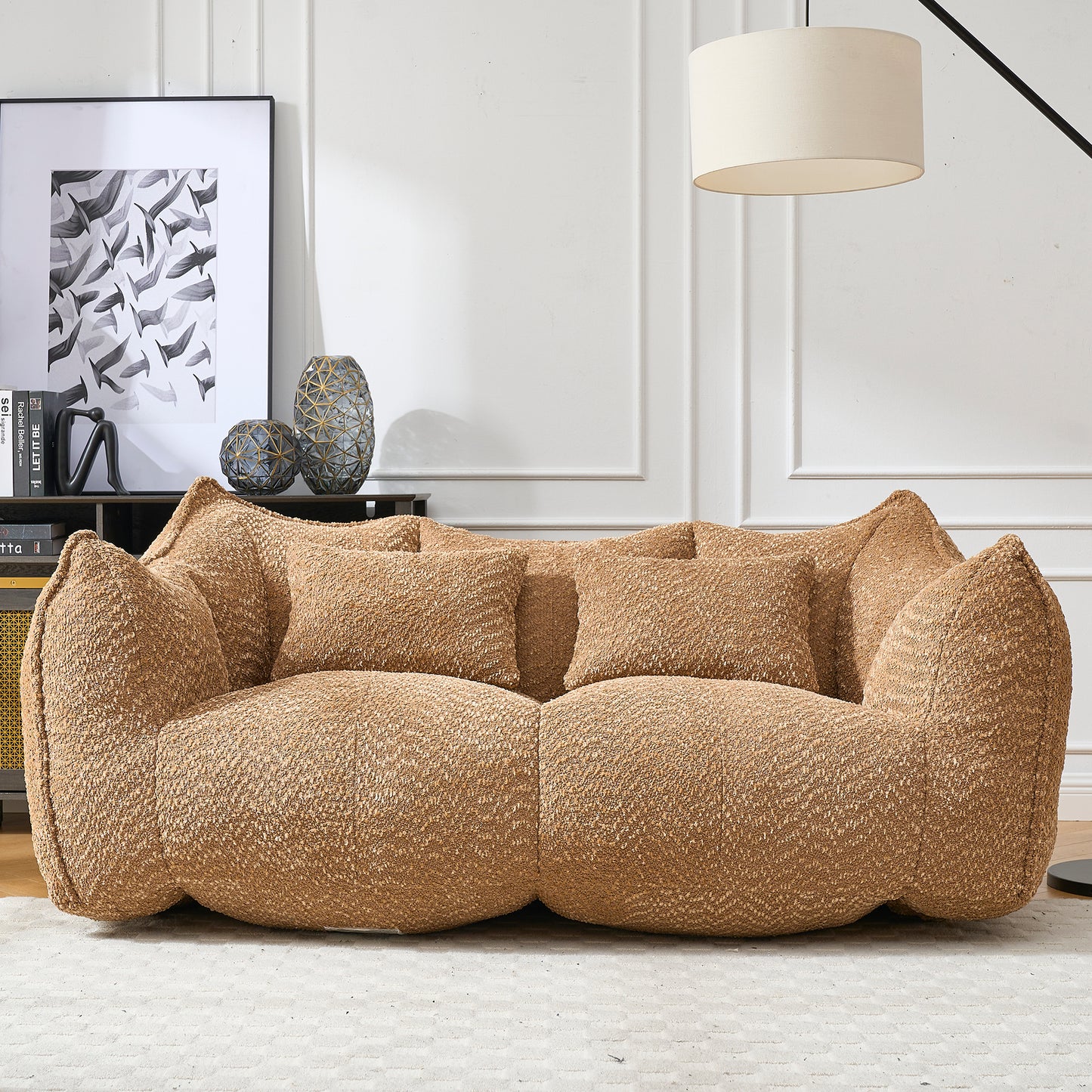 Cozy teddy fabric sofa in warm brown featuring plush cushions and a modern inviting design