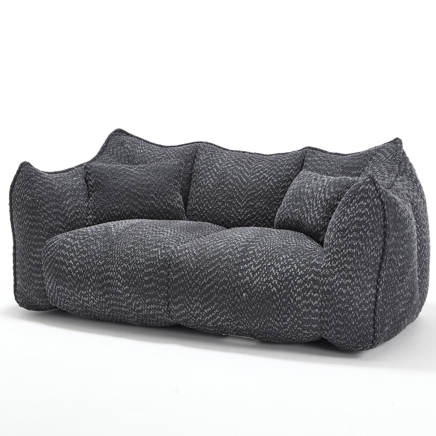 Dark gray textured sofa with herringbone pattern fabric and plush cushions modern living room furniture