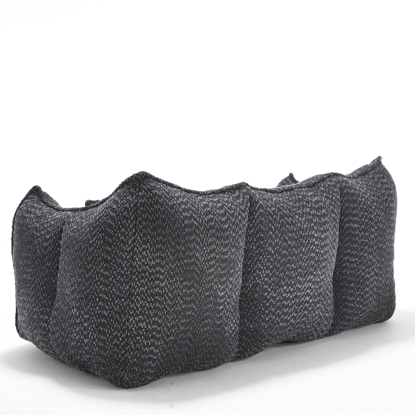 Textured charcoal grey lumbar pillow with segmented design