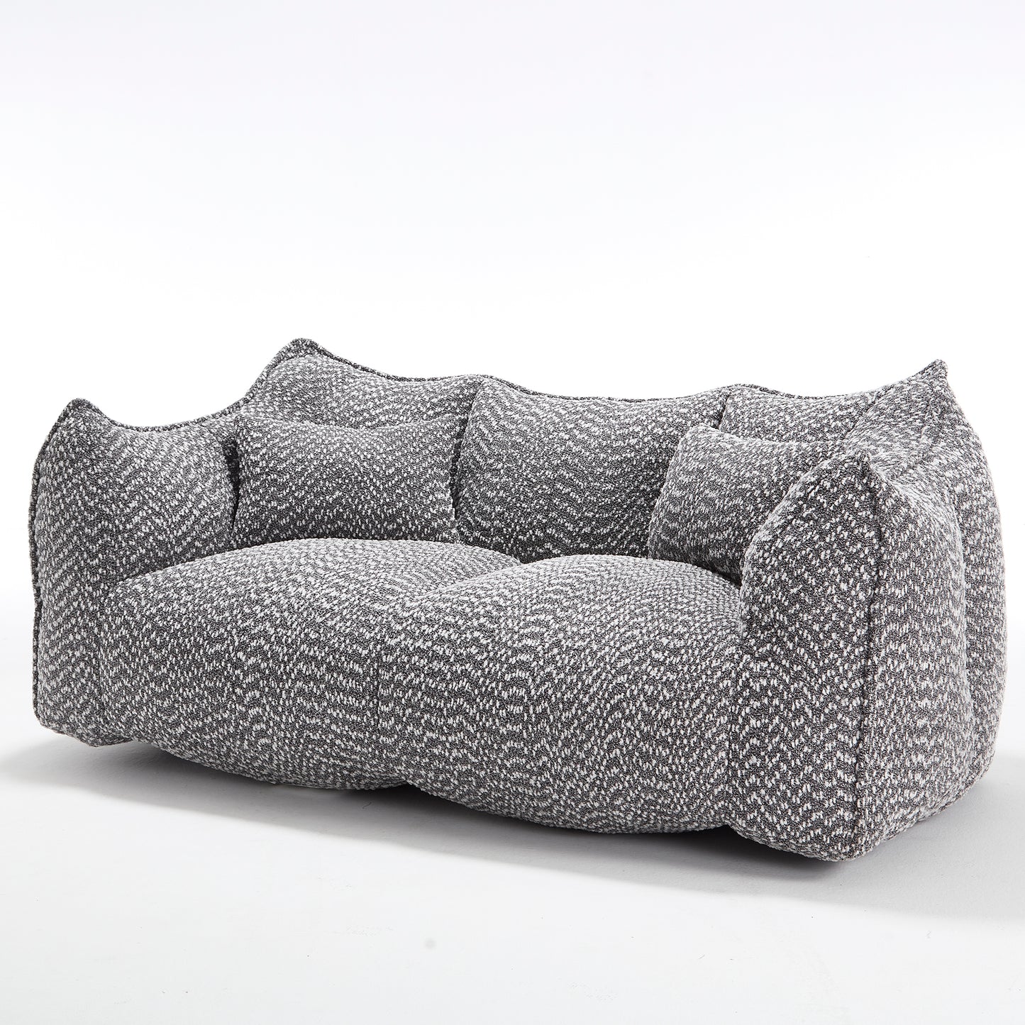 Cozy grey and white herringbone textured sectional sofa with plush cushions
