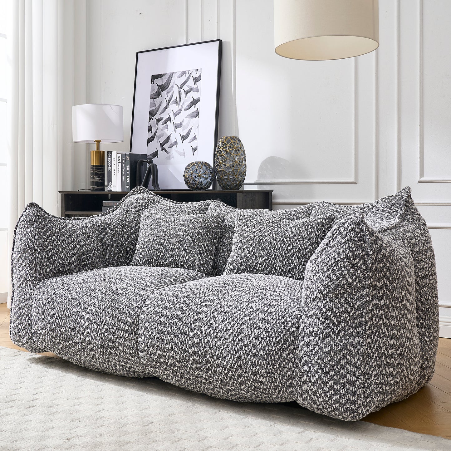 Plush modern sofa in a grey and white herringbone chenille fabric with oversized sinkin cushions