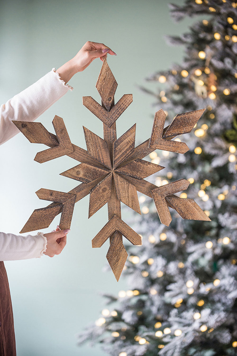 Rustic wooden snowflake decor perfect for winter holiday displays