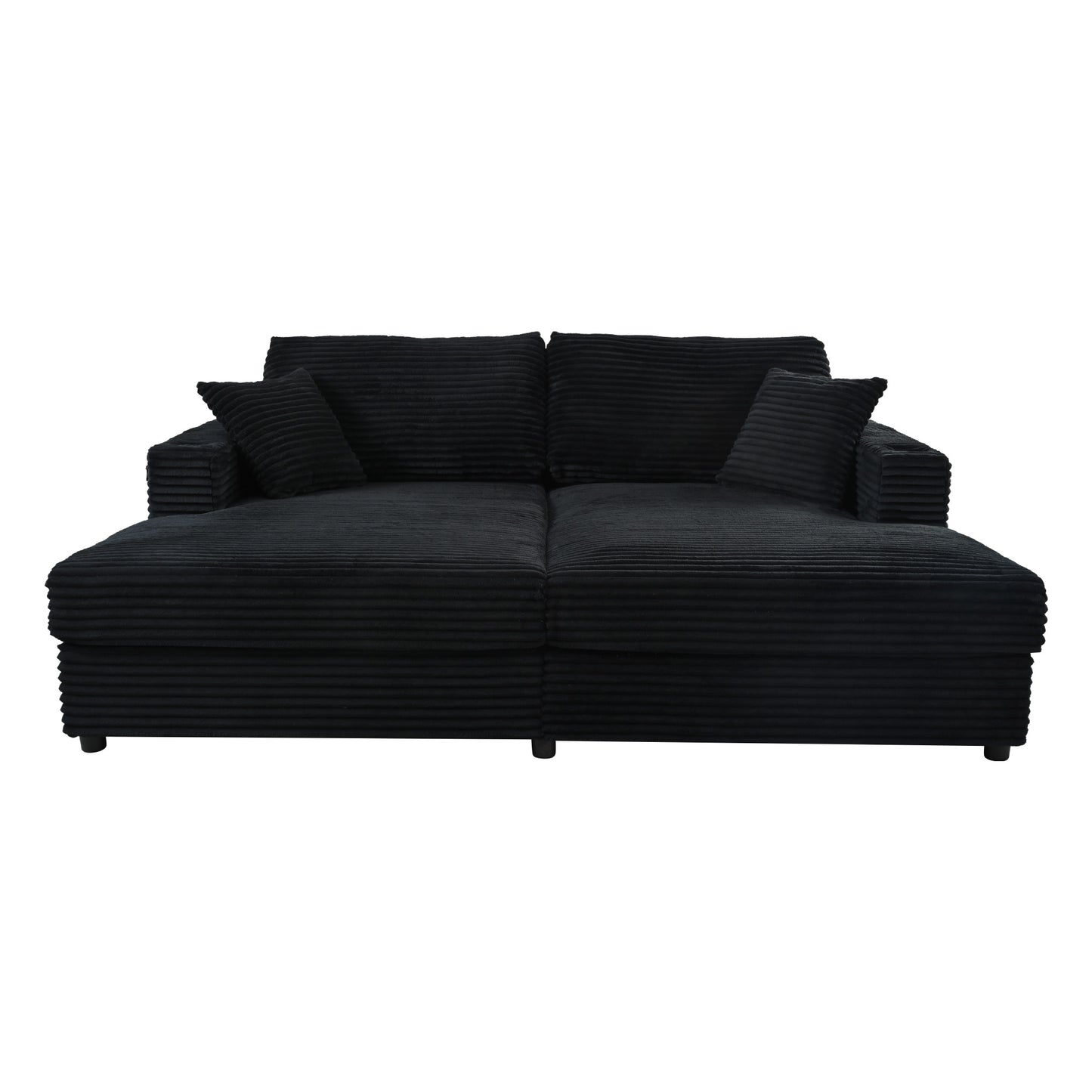 Black corduroy sectional sofa with two throw pillows