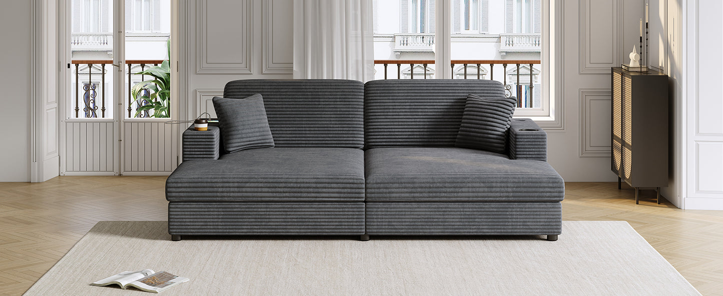 Dark gray corduroy sectional sofa with builtin cup holders and matching throw pillows