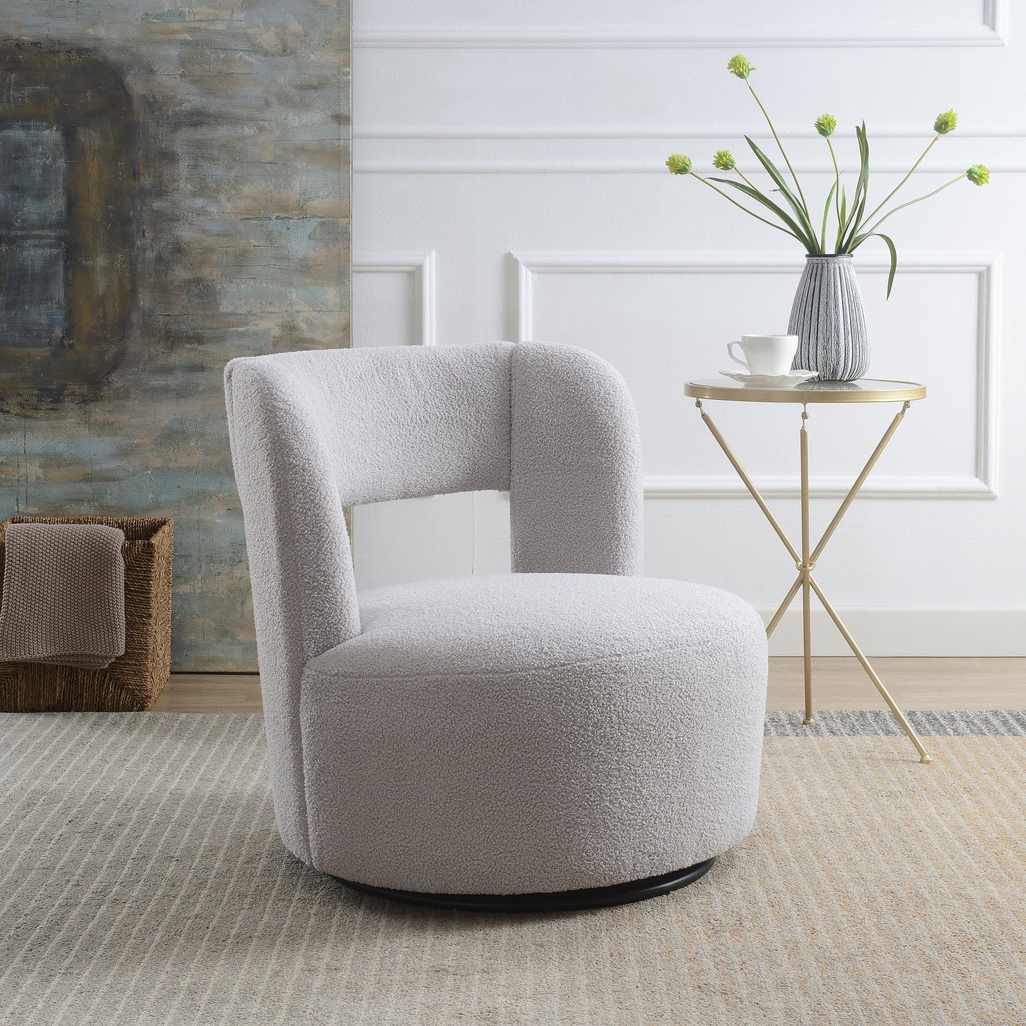 Cozy grey boucl swivel armchair with a modern rounded design perfect for living rooms
