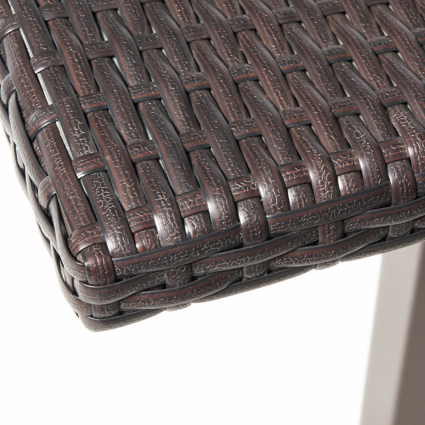 Closeup of dark brown wicker furniture material weave