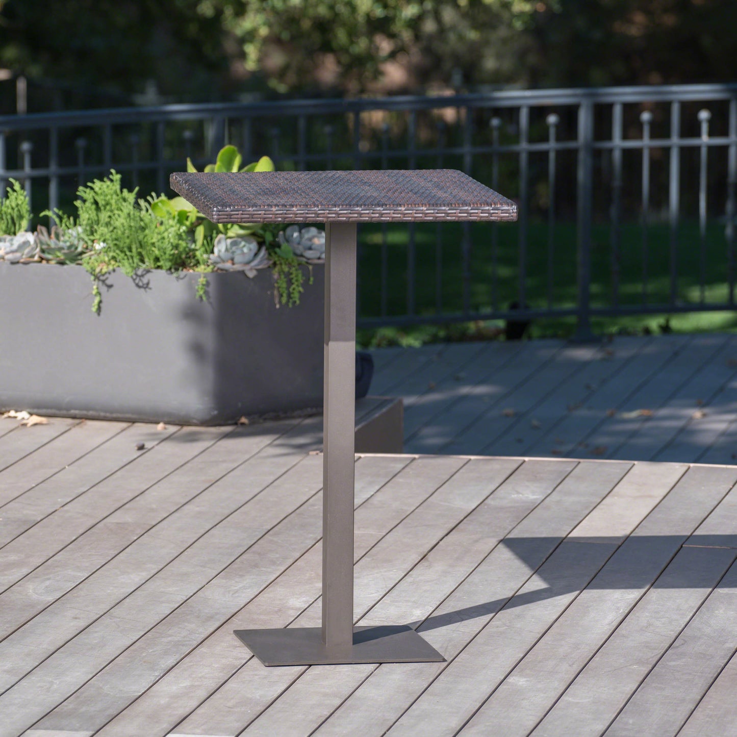 Woven top patio side table with bronze finish base
