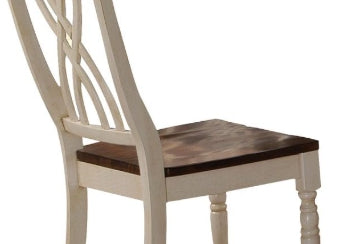 Elegant farmhouse dining chair with distressed cream frame and dark wood seat