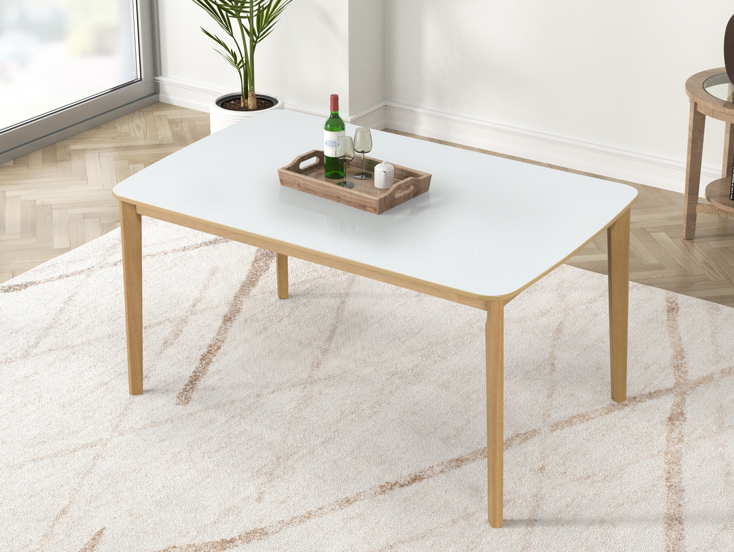 Modern white dining table with natural wood legs and rounded corners