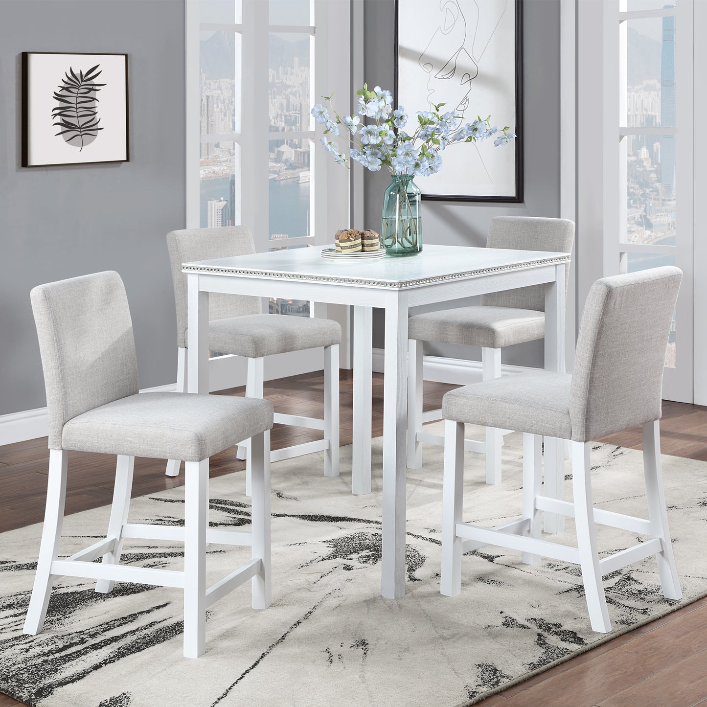 White counter height dining set with four upholstered bar stools