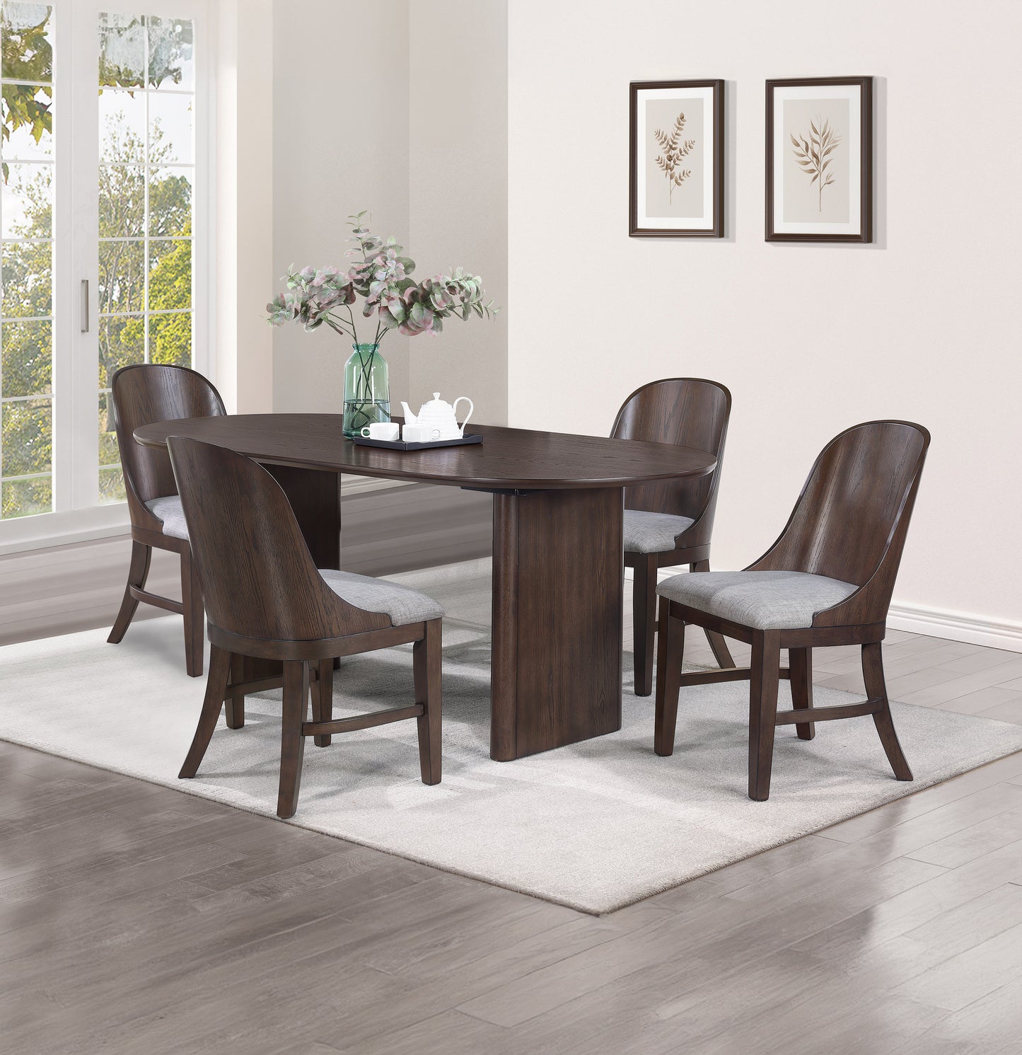 Dark walnut oval dining table with upholstered gray chairs perfect for modern homes