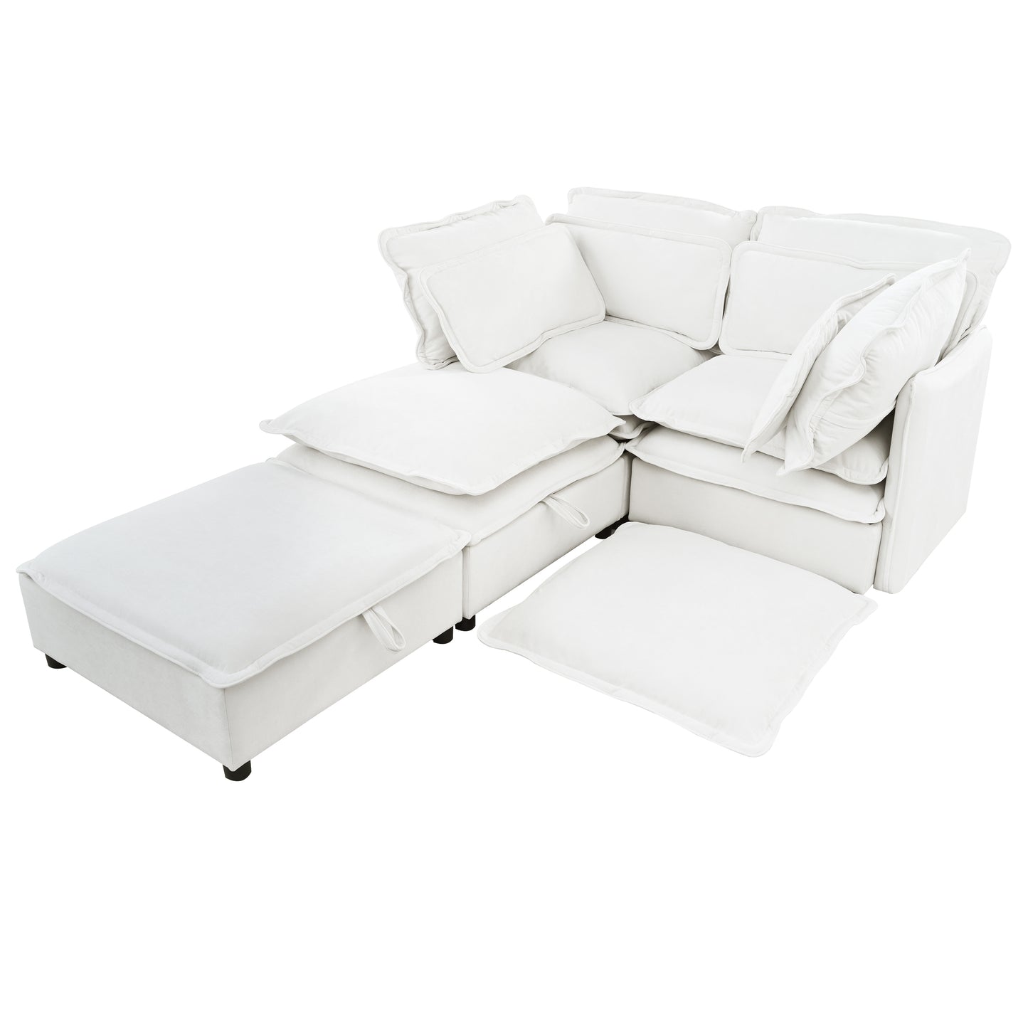 White modular sectional sofa with plush cushions and a storage ottoman