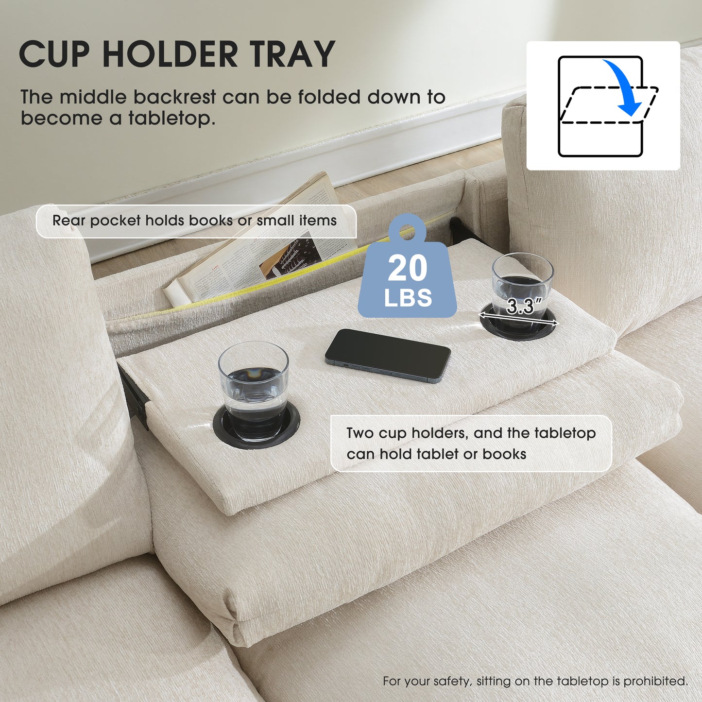 Beige sofa with integrated cup holder tray and tabletop holding glasses and phone