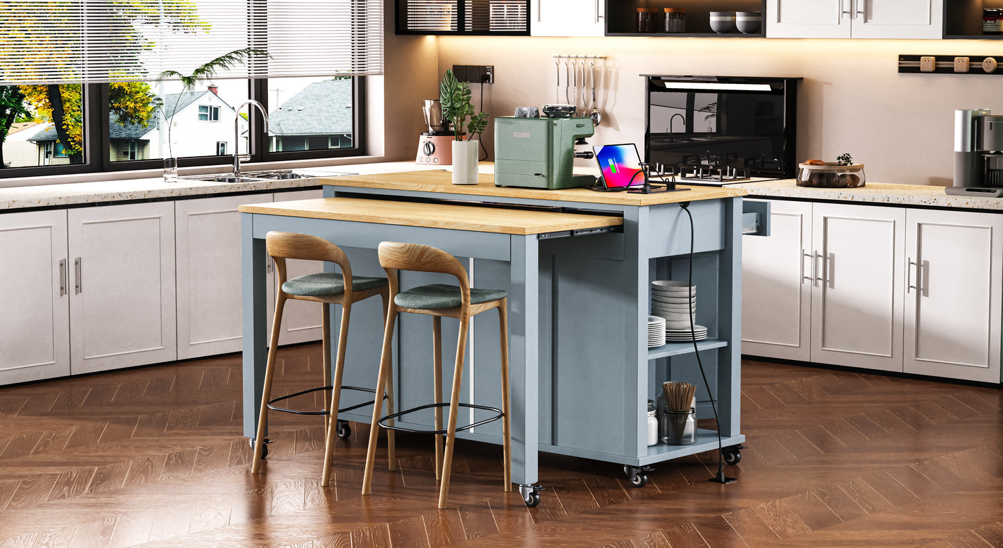 Sage green retro coffee maker with chrome accents on a wooden kitchen island