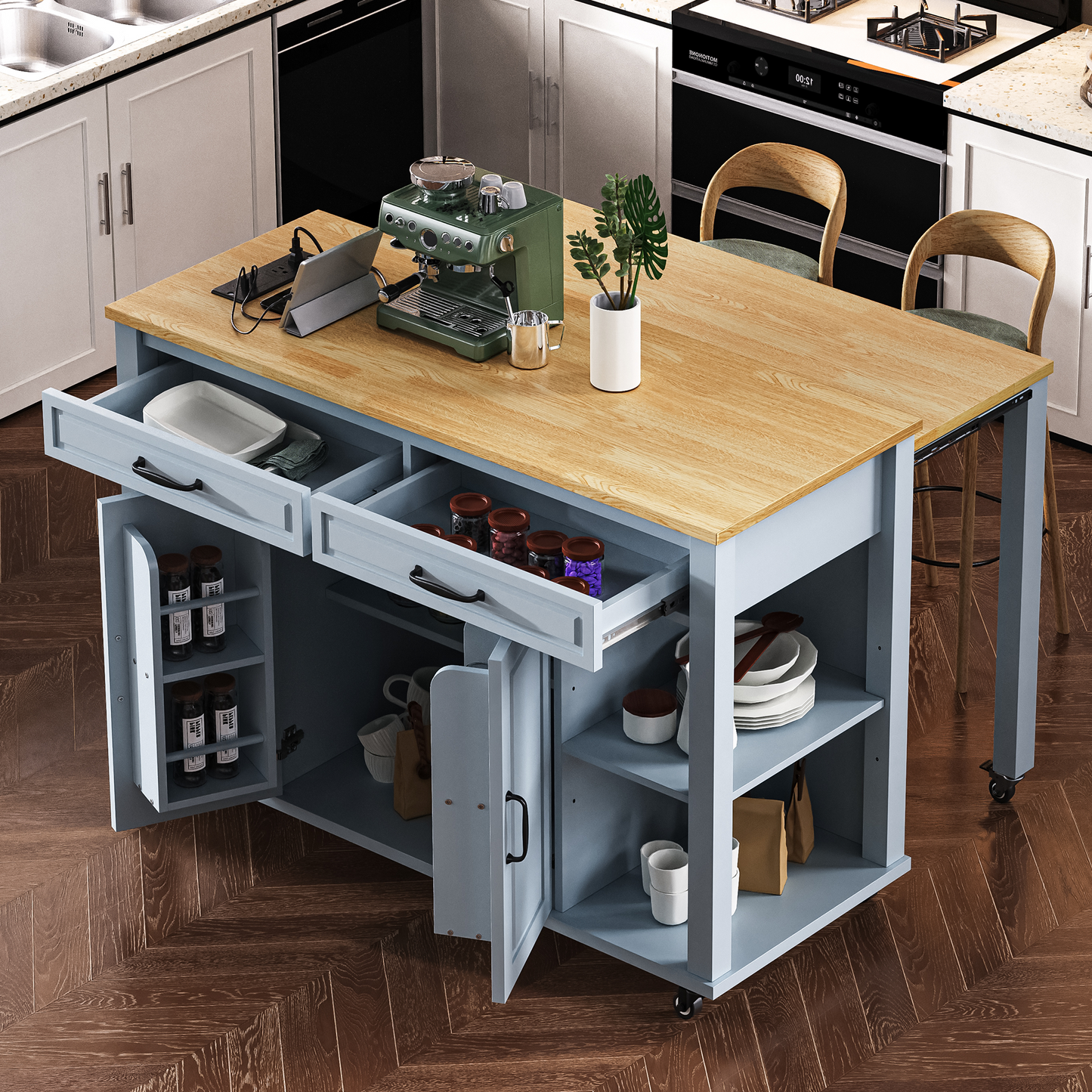 Green espresso machine with stainless steel accents on a wooden kitchen island