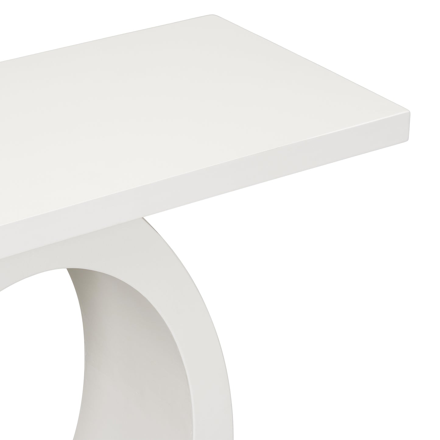 Closeup of a modern white console table with a curved pedestal base