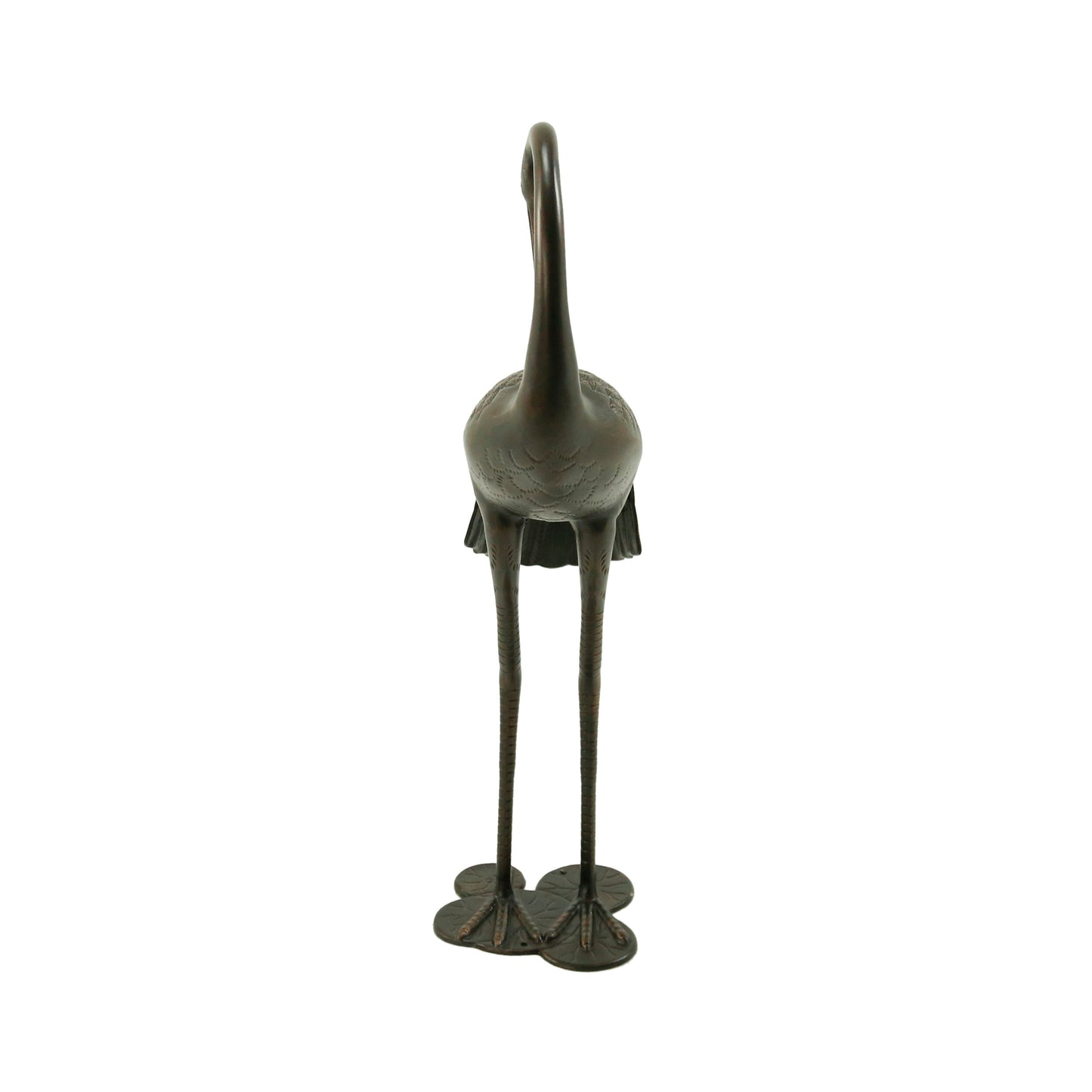 Bronze crane statue with intricate feather details and long legs standing on a decorative base