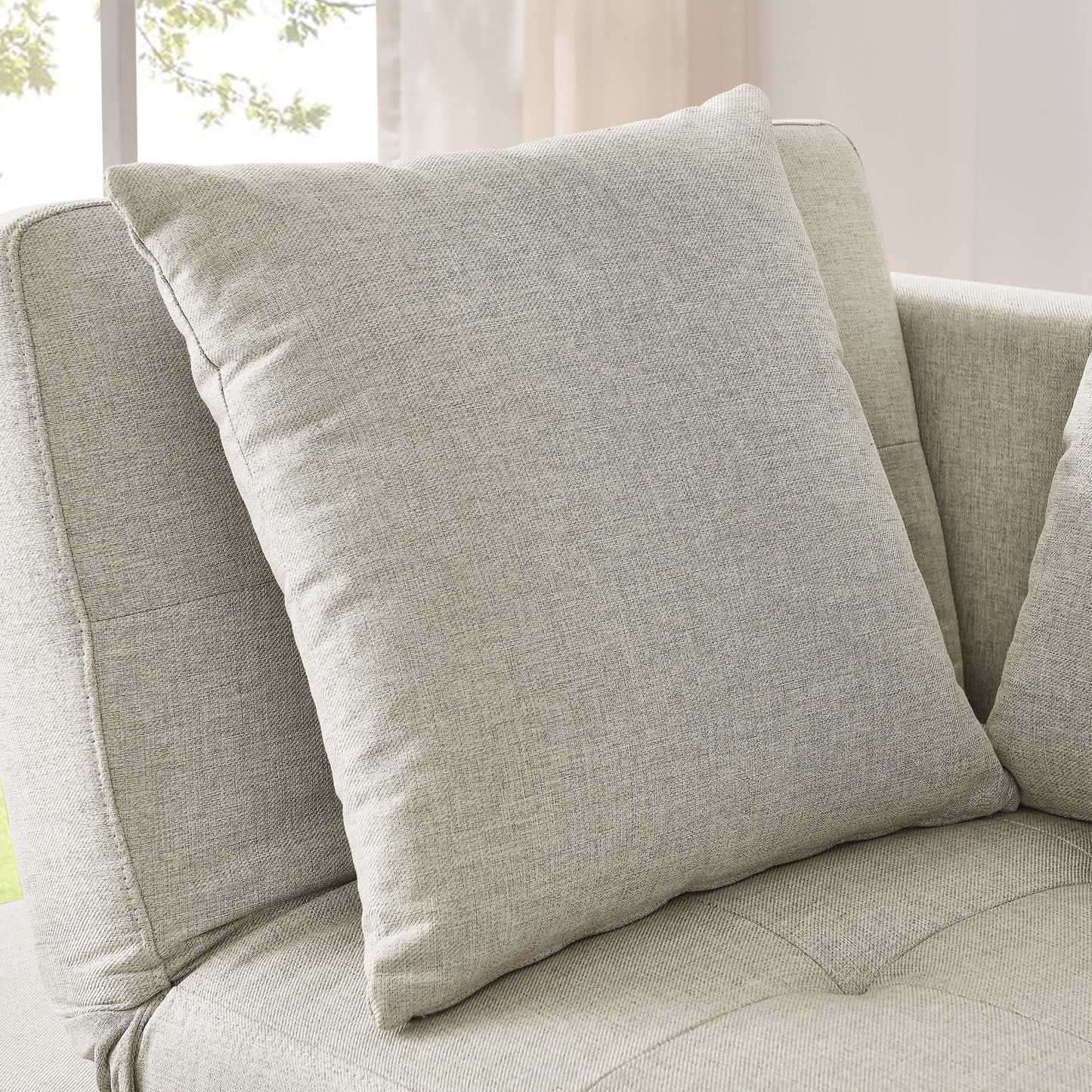 Textured light grey woven throw pillow with a clean modern design